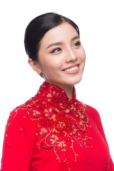 Charming Vietnamese Woman in Ao Dai Traditional Dress isolated on white.