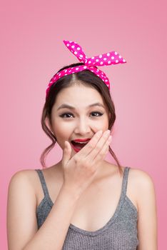 Surprised asian girl with pretty smile in pinup makeup style