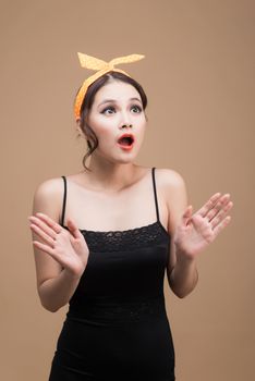 Surprised asian girl with pretty smile in pinup makeup style