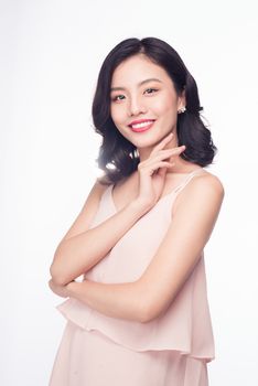 Glamour portrait of beautiful ASIAN woman model with nice makeup and romantic wavy hairstyle.