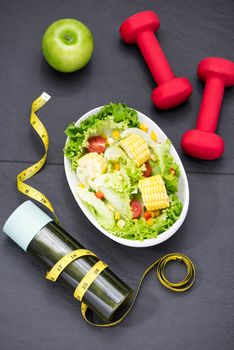 Healthy fitness meal with fresh salad. Diet concept.