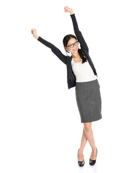 Full length portrait of young Asian female arms outstretched and smiling, isolated on white background.