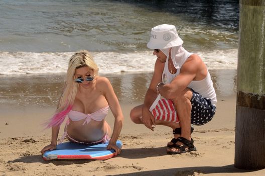 Frenchy Morgan, Jesse Willesee at Malibu beach where the Australian Musician teaches the "Celebrity Big Brother" star to Boogie Board, Malibu Beach, Malibu, CA 04--10-17