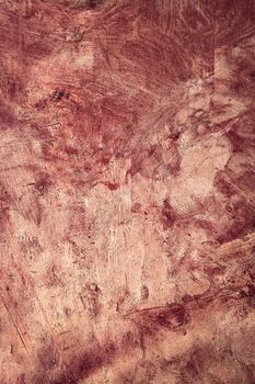 abstract background or texture old scratched red plaster