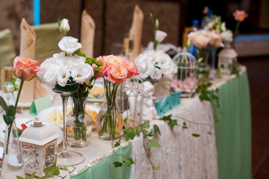 Beautiful decor of flowers at the wedding table.