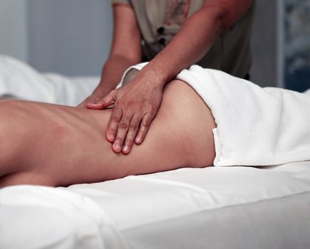White woman on massage in spa salon