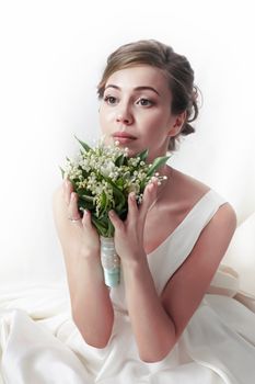 The beautiful bride with bouquet