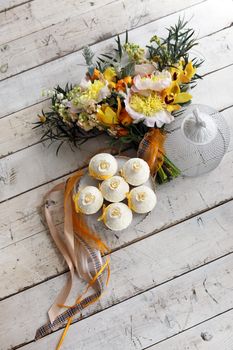 Beautiful cakes and bridal bouquet in orange tones