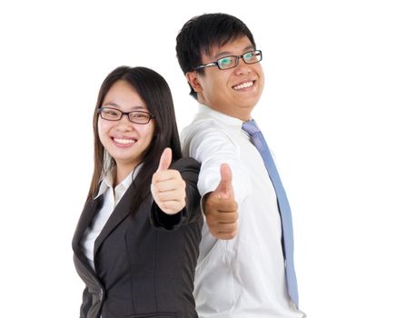 happy business man and woman with thumbs up