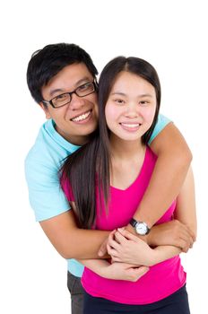 Young happy couple hugging and smiling