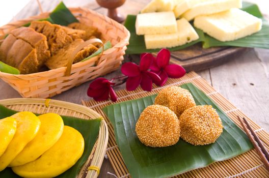 Ma Lai Gou-Traditional malaysia steamed cake.Malaysia desert ,Onde-Onde or known as Chinese Sesame Ball on banana leaf. Steam chinese cake on bamboo plate. Chinese egg cake on banana leaf.