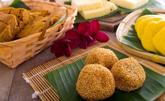 Ma Lai Gou-Traditional malaysia steamed cake.Malaysia desert ,Onde-Onde or known as Chinese Sesame Ball on banana leaf. Steam chinese cake on bamboo plate. Chinese egg cake on banana leaf.