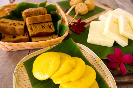 Ma Lai Gou-Traditional malaysia steamed cake.Malaysia desert ,Onde-Onde or known as Chinese Sesame Ball on banana leaf. Steam chinese cake on bamboo plate. Chinese egg cake on banana leaf.