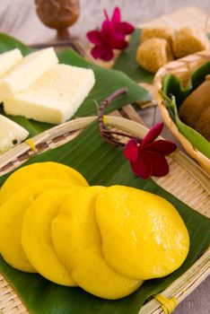 Ma Lai Gou-Traditional malaysia steamed cake.Malaysia desert ,Onde-Onde or known as Chinese Sesame Ball on banana leaf. Steam chinese cake on bamboo plate. Chinese egg cake on banana leaf.