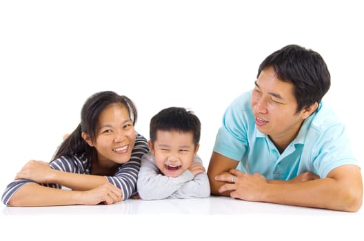 Indoor portrait of beautiful asian family