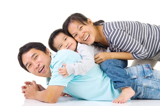 Indoor portrait of beautiful asian family