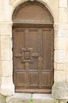 old wooden door of a house in Provence, France