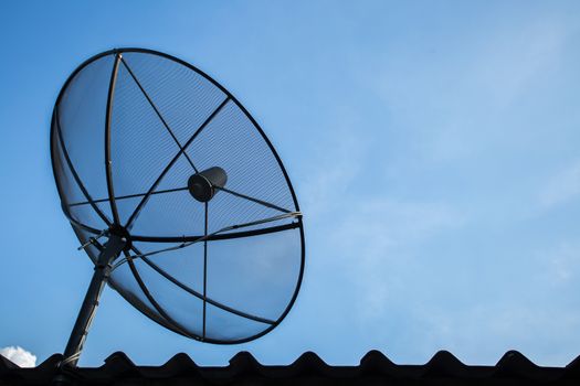 satelite dish of cable tv for home use on the roof