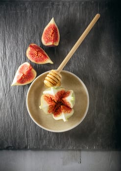 Fresh fig on the plate with honey