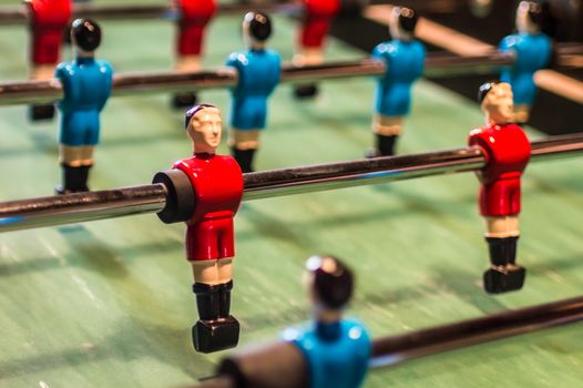 Table football game, Soccer table with red and blue players in France