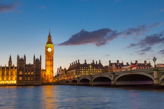 Big Ben, Palace of Westminster aka Houses of Parliament and Westminster's bridge at dusk, London, United Kingdom.