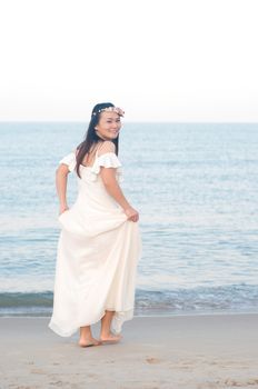 Outdoor Bride on the beach in the evening