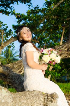 Outdoor portrait of a beautiful asian bride