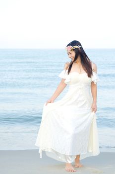 Outdoor Bride on the beach in the evening