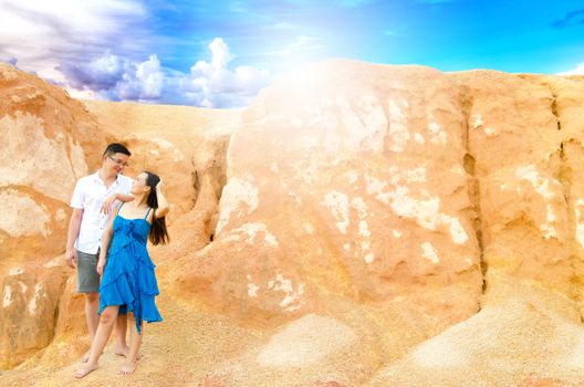 Asian couple with canyon background. Valentine's day concept