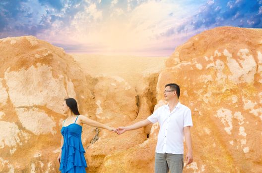 Asian couple with canyon background. Valentine's day concept