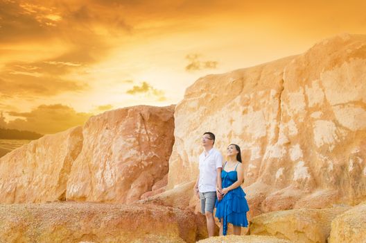 Asian couple with canyon background. Valentine's day concept