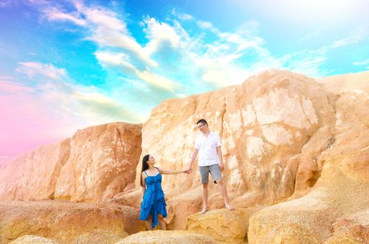 Asian couple with canyon background. Valentine's day concept