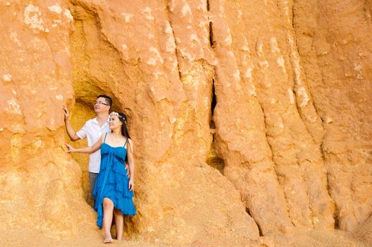 Asian couple with canyon background. Valentine's day concept