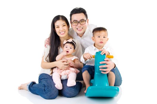 Indoor portrait of asian family