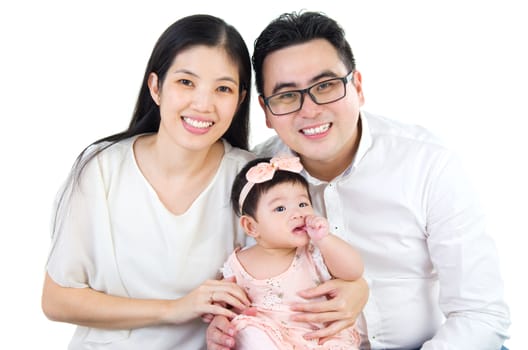 Indoor portrait of beautiful asian family