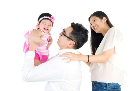Asian parent playing with baby girl