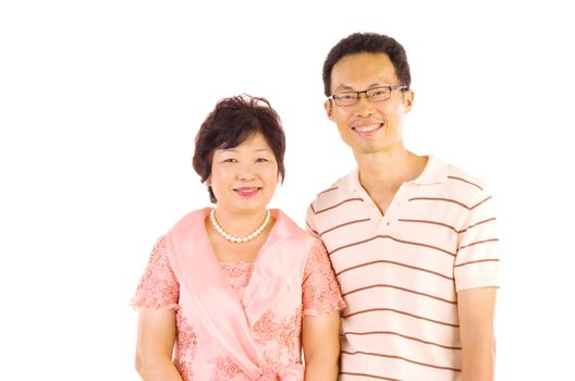 Asian mother and son. Happy Asian family mother and adult offspring having fun time at indoor studio.