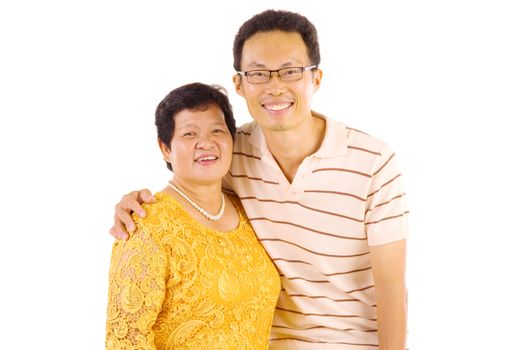 Asian mother and son. Happy Asian family mother and adult offspring having fun time at indoor studio.