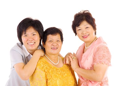 Indoor portrait of beautiful asian family over white background