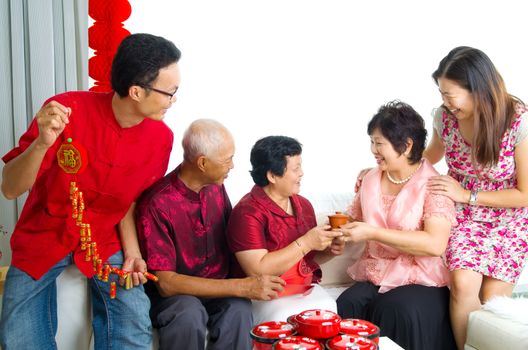 asian family celebrate chinese new year