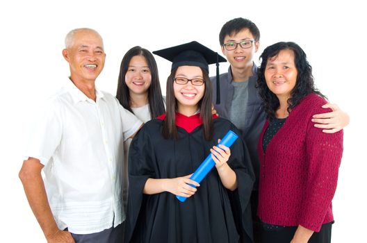 Asian family celebrate graduation for family member