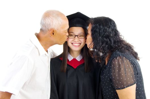 Asian university student and parents celebrating graduation