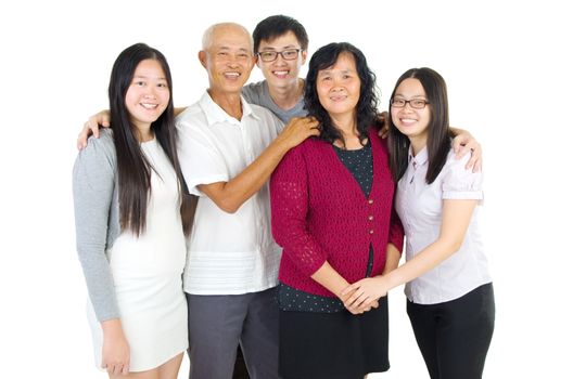 Asian parent with their adult sons and daughter with white background. Family living lifestyle.