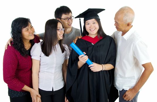 Asian family celebrate graduation for family member 