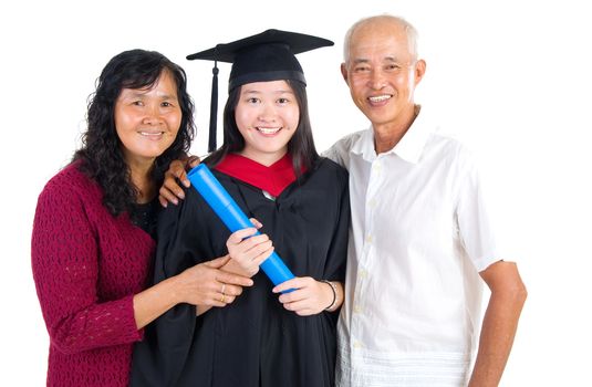 Asian university student and family celebrating graduation