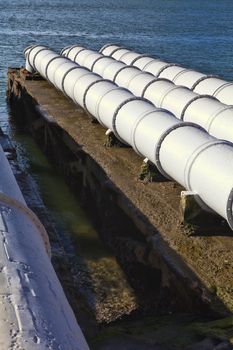 A close up of large sewage pipes