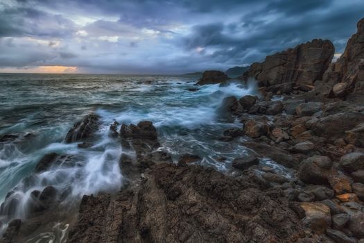 Waves and foam in the Cantabrico sea, in Bermeo