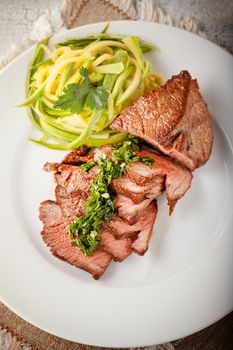 Zucchini pasta and meat. Grain effect added.