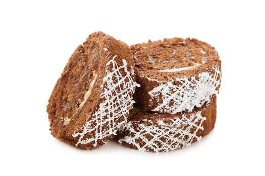 Slices of sweet chocolate roll cake decorated with Coconut chips isolated on white background