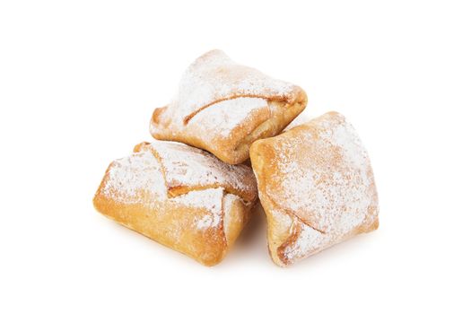 Cookies of puff pastry topped with powdered sugar isolated on white background